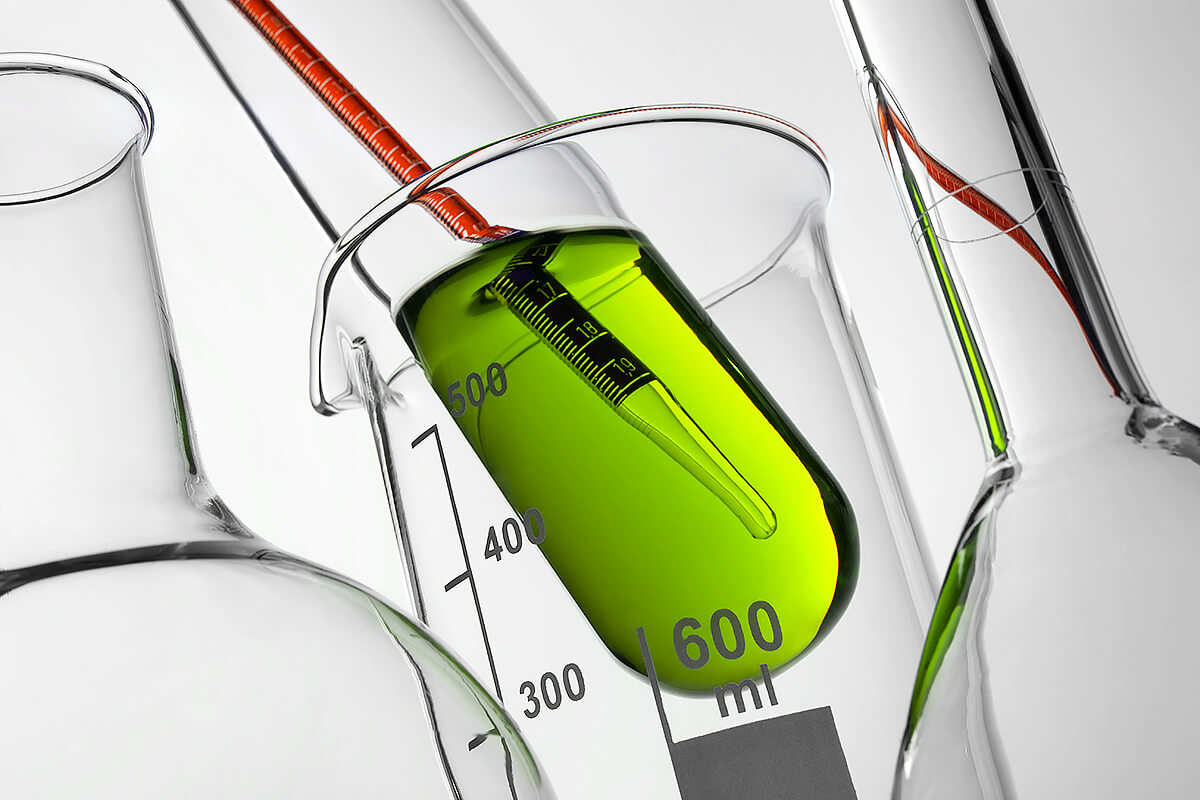 Photo of a pipette getting dipped into a test tube.