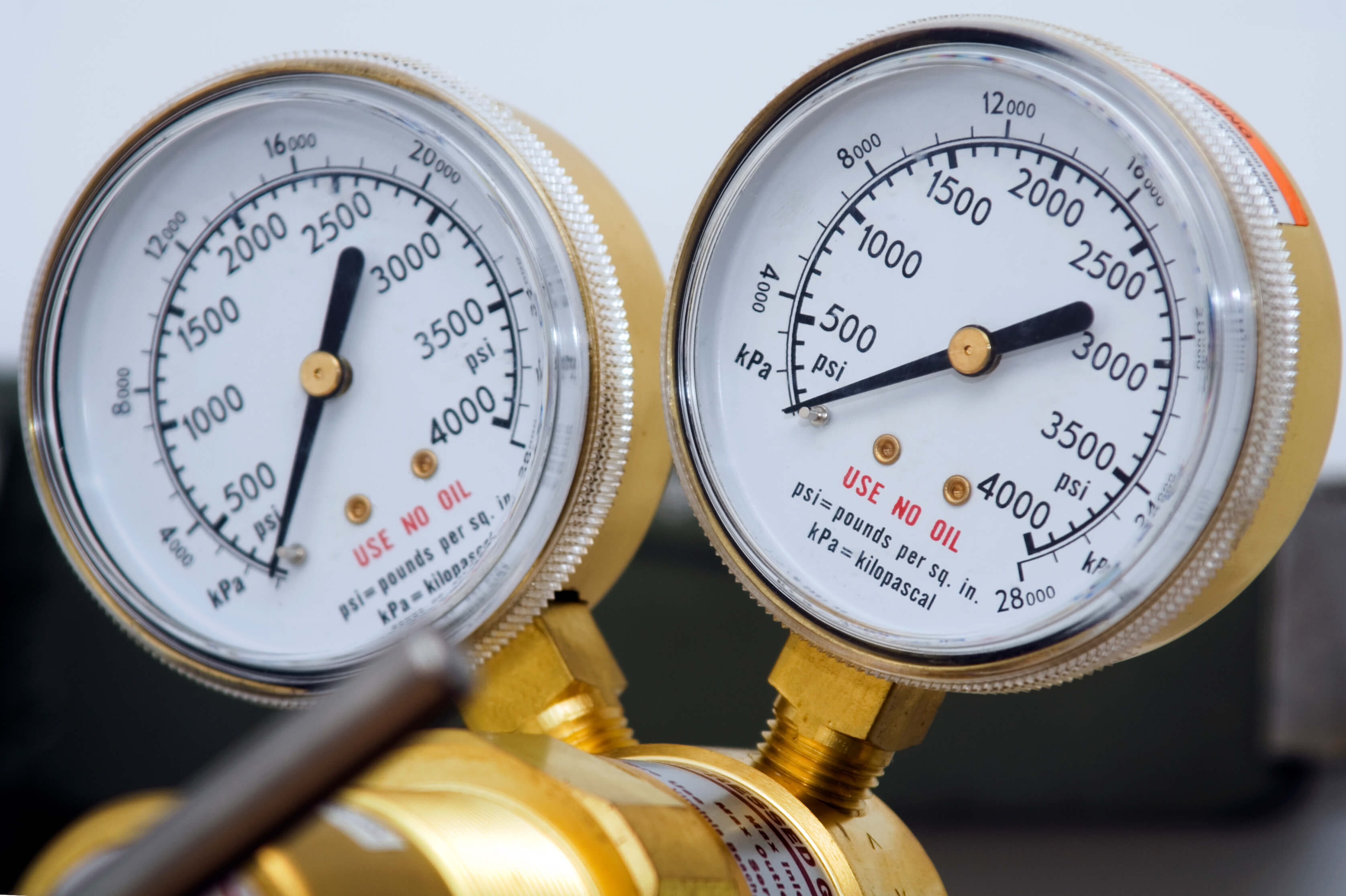 Close-up photo of two pressure guages. 