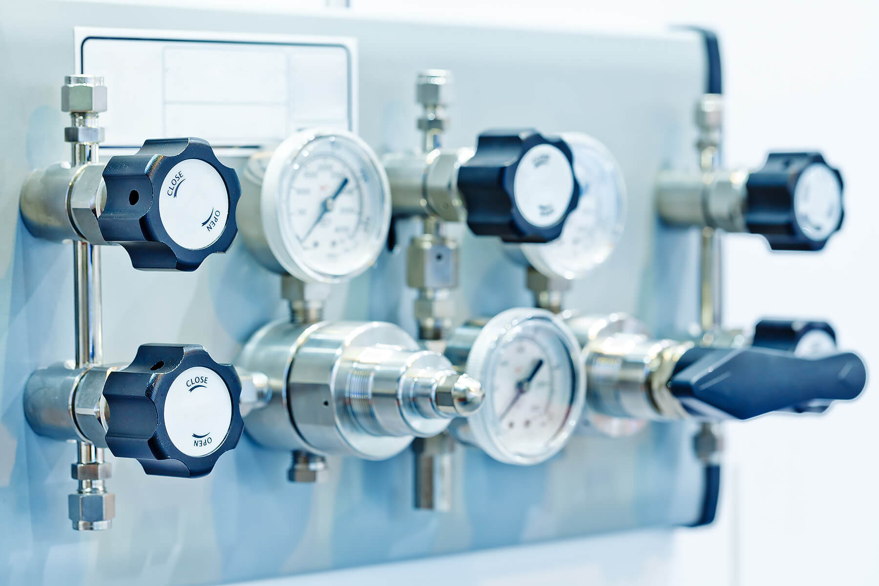 Close-up photo of pressure guages and controls.